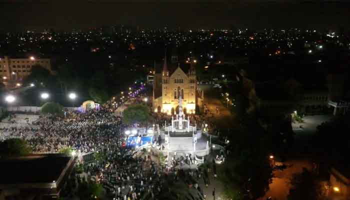 An aerial view of the St. Patrickss Cathedral seen illuminated with lights and people gathered for the celebrations of the diamond jubilee of the Archdiocese of Karachi — Provided by the author