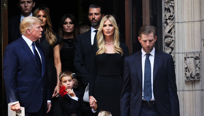 Former US President Donald Trump with his daughter Ivanka Trump (centre), among his other children, out of St Vincent Ferrer Roman Catholic Church on July 20, 2022, in New York City. — AFP