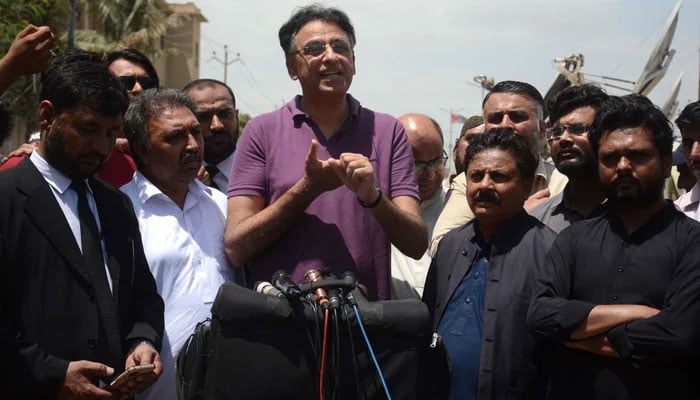 Former PTI secretary general Asad Umar speaks to the media in Karachi on September 3, 2022. — INP