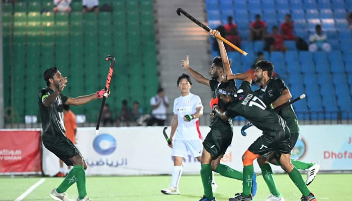 Pakistani players celebrate after scoring a goal against Japan. — Reporter