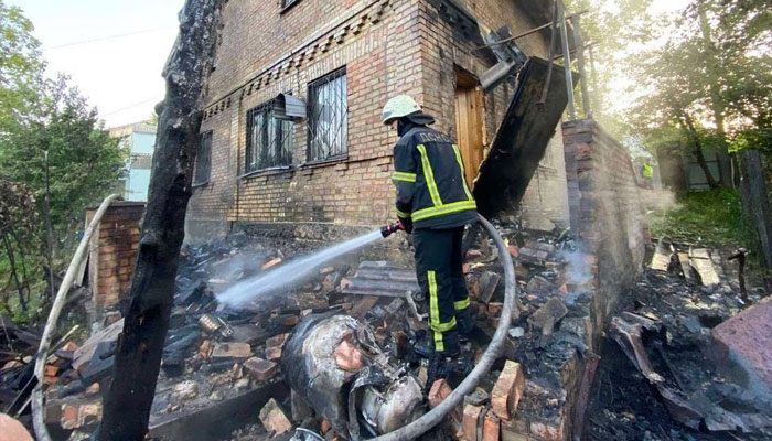 A firefighter works at a site of a private house damaged by remains of a cruise missile during a massive Russian air strike, amid Russias attack on Ukraine, in Kyiv region, Ukraine May 29, 2023.—Reuters