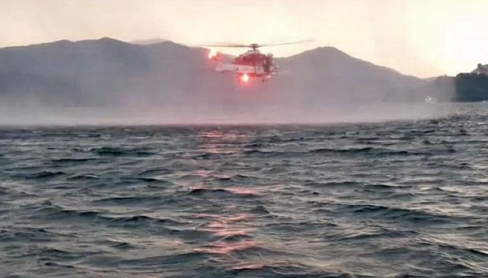 Italys fire service shared a photo of a helicopter taking part in the rescue.—VIGILI DEL FUOCO/TWITTER
