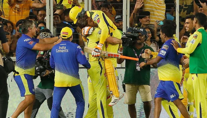 CSK captain Mahendra Singh Dhoni lifting Ravindra Jadeja after winning the final of IPL 2023.—BCCI/IPL
