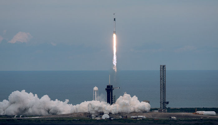The SpaceX Falcon 9 rocket can be seen lifting off from pad 39A at the Kennedy Space Center on May 21, 2023, in Cape Canaveral, Florida. — AFP