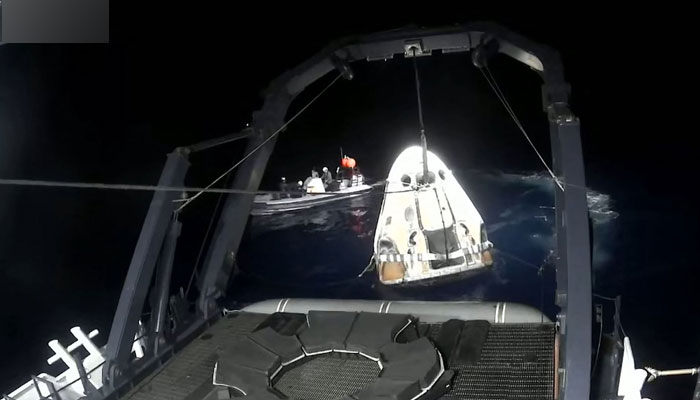 This still image taken from an Axiom Space video shows a SpaceX capsule being retrieved after splashdown off the coast of Florida on May 31, 2023. — AFP