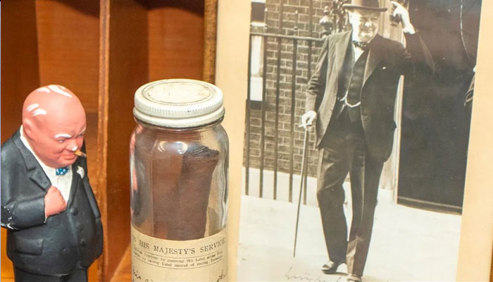 The cigar has been preserved for nearly 80 years in a glass jar.—hansons_auctioneers