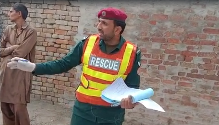 A  rescue 1122 worker present at the site of the explosion in Punjabs Kot Addu on June 1, 2023. — photo by author
