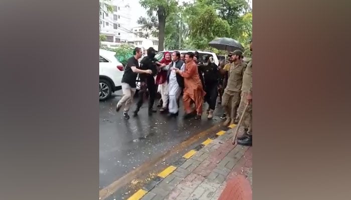 Pakistan Tehreek-e-Insaf (PTI) President Parvez Elahi is being taken into custody, in this still image taken from the video, on June 1, 2023. — YouTube/GeoNews