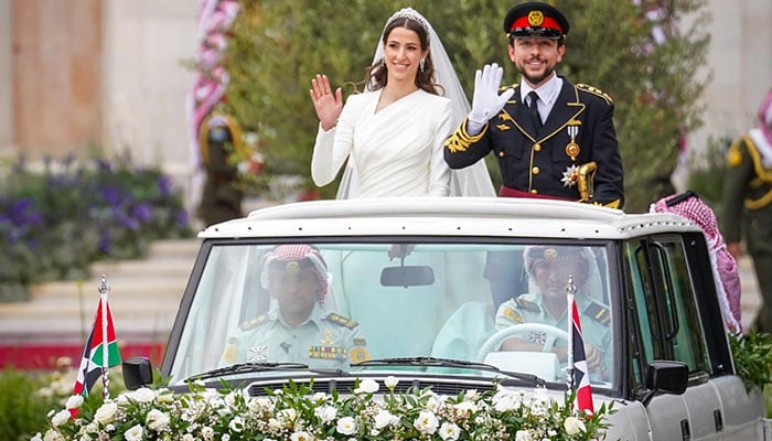 Crown Prince of Jordan Al Hussein bin Abdullah II (right) with his wife Rajwa Al-Saif (right) on Thursday, June 1, 2023. — Twitter/@CoutureRoyals