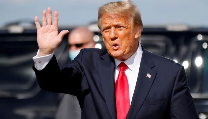 Former US President Donald Trump waves as he arrives at Palm Beach International Airport in West Palm Beach, Florida, US. — Reuters/File