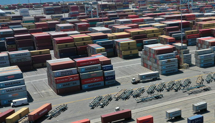 Containers are seen on a shipping dock. — Reuters