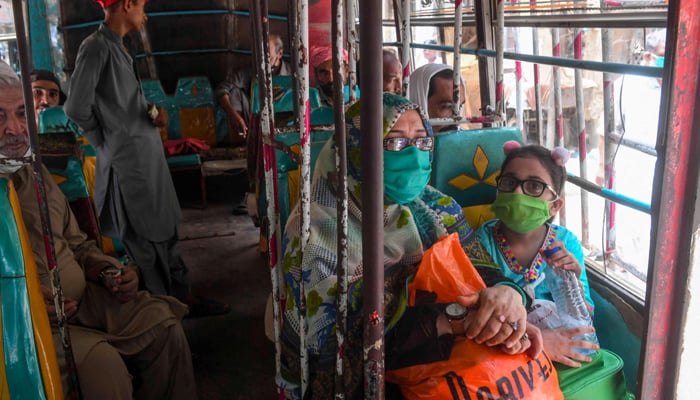 An undated image of passengers seated in a public mini bus. — AFP/File