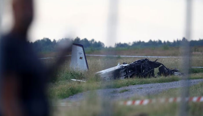 A small aircraft is seen after crash. — Reuters/File