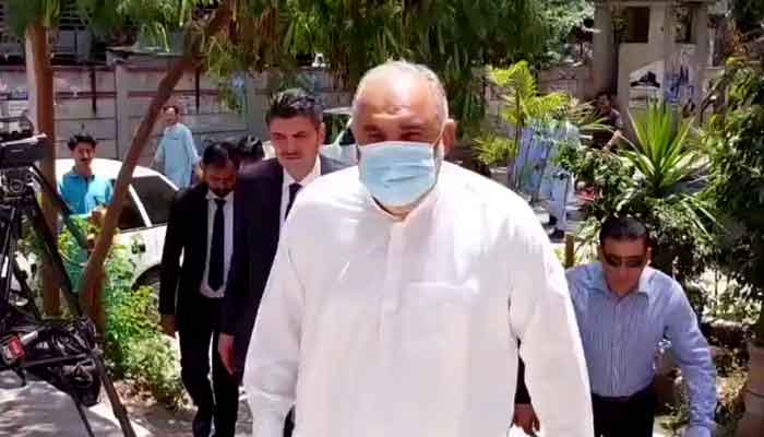 Senior Pakistan Tehreek-e-Insaf (PTI) leader Asad Qaiser arrives at an Islamabad court, in this still taken from a video. — YouTube/Geo News Live