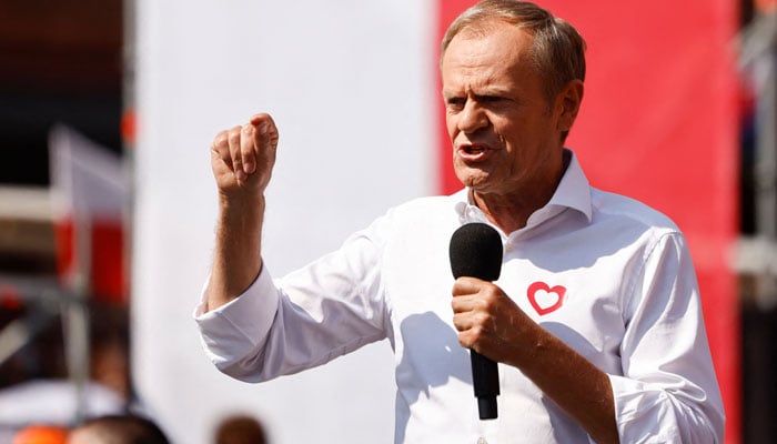 Donald Tusk, leader of the Polish Civic Platform party speaks during a rally during an anti-government demonstration organised by the opposition in Warsaw on June 4, 2023. — AFP