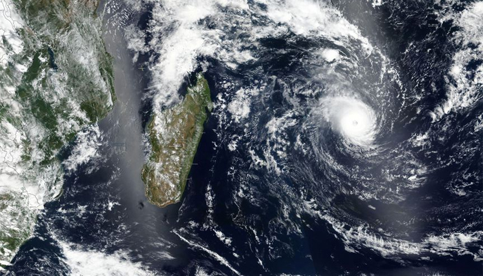 Satellite imagery showing a cyclone approaching a coast in this undated satellite handout image. — Reuters