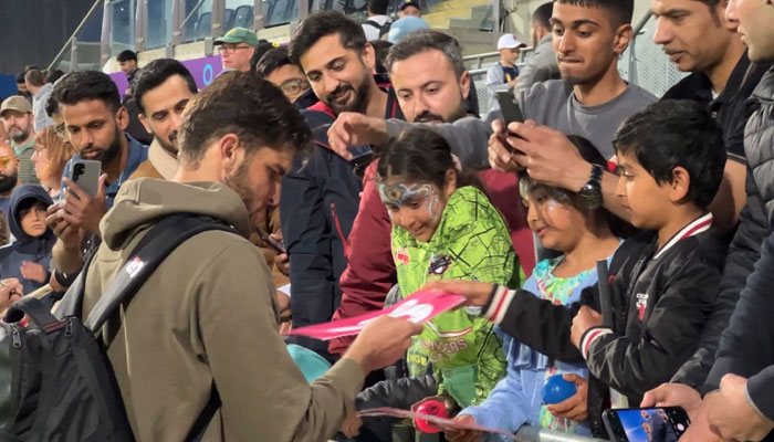 Shaheen Afridi's fans waited patiently for almost an hour to get his autograph or selfie.  - The author