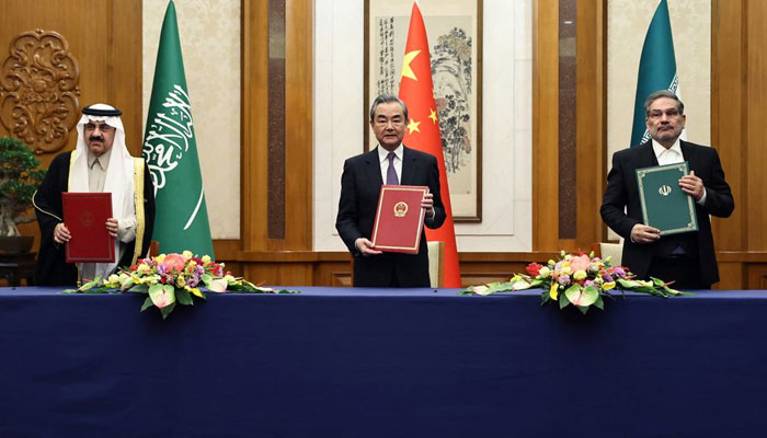 Wang Yi (c), a member of the Political Bureau of the Communist Party of China attends a meeting with Secretary of Irans Supreme NSC Ali Shamkhani (right) and Minister of State and national security adviser of Saudi Arabia Musaad bin Mohammed Al Aiban in Beijing, China March 10, 2023. — Reuters