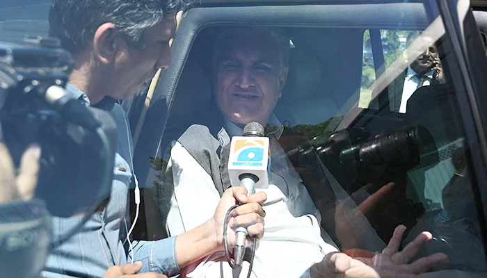 Shah Mahmood Qureshi, deputy head of PTI, speaks with the media in Islamabad on May 10, 2023. — AFP