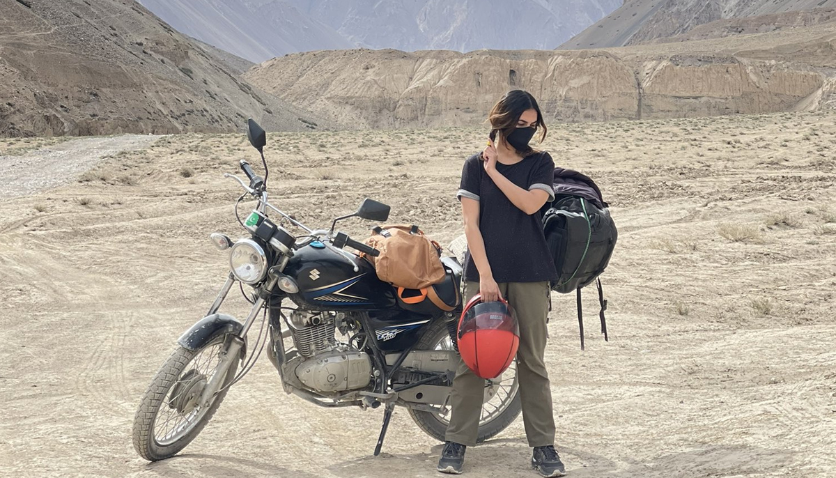 Huma Tariq stands in the middle of the Chipursan Valley in the Hunza District of Gilgit−Baltistan. — Twitter/@TheNorthDrive