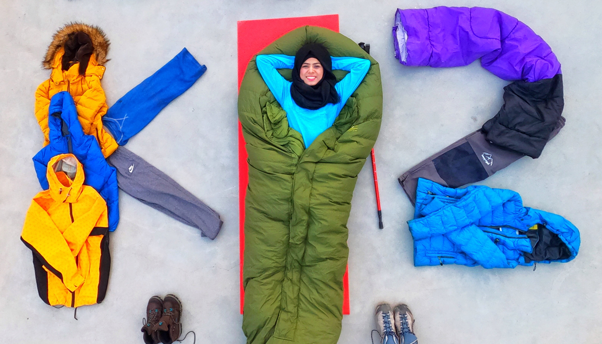 Hafsa Asad lies inside a sleeping bag with all her essentials set beside her. — Photo supplied by author