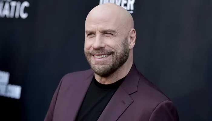 John Travolta leaves fans confused by sharing video of Tom Cruise cake