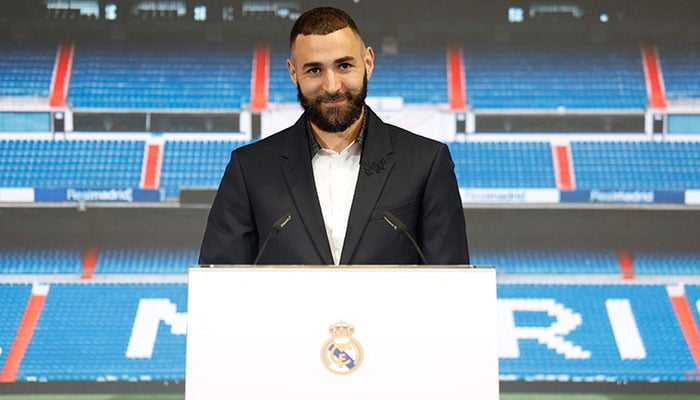 This handout picture taken and released by Real Madrid.com on June 6, 2023, shows French forward Karim Benzema delivering a speech during his farewell ceremony at Real Madrid club in Madrid.—AFP