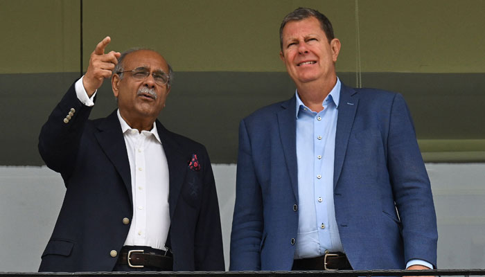 International Cricket Council (ICC) Chairman Greg Barclay (right) visits the Gaddafi Stadium along with Pakistan Cricket Board Chairman (PCB) Najam Sethi (L) in Lahore on May 30, 2023. — AFP