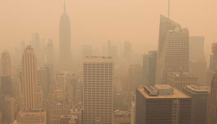 A view from the top of Rockefeller Center as haze and smoke caused by wildfires in Canada hang over the Manhattan skyline in New York City, June 7, 2023. -Reuters