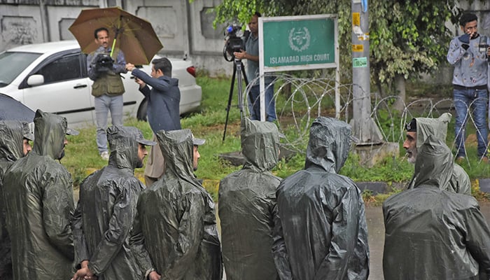 Personnel of Rangers stands guard to maintain security, on the arrival of former prime minister to Islamabad High Court for a hearing. — Online/File