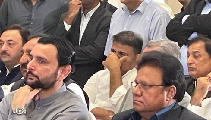 Fawad Chaudhry is seen sittingat a launching ceremony of the Istihkam-e-Pakistan Party. — Twitter/iihtish