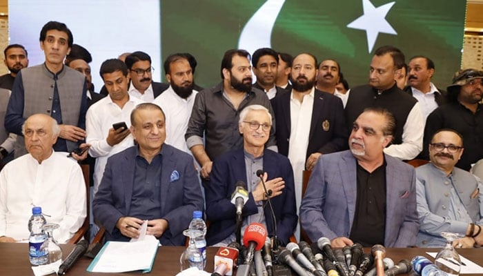 Former prime minister of Azad Jammu and Kashmir Sardar Tanveer Ilyas at the far right with Imran Ismail, Jahangir Tareen and Aleem Khan during the launch of IPP. — Facebook/Aleem Khan