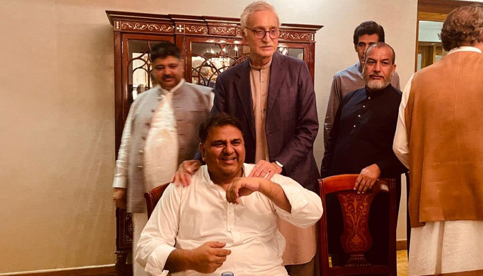 Fawad Chaudhry with Jahangir Tareen at Aleem Khans residence. — Twitter/@SHABAZGIL