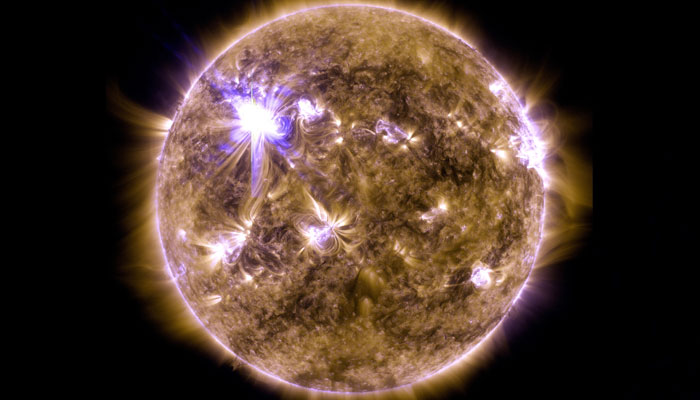 An X-class solar flare flashes on the edge of the Sun on March 7, 2012. — Nasa