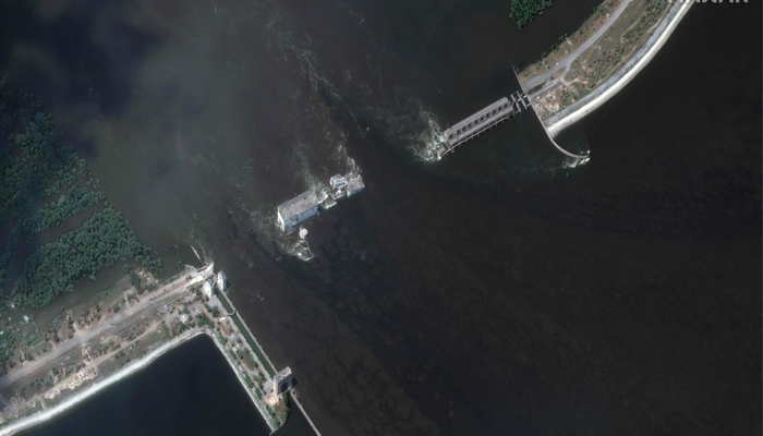 This satellite image shows the Nova Kakhovka dam and hydroelectric plant after the June 7, 2023, destruction. — AFP