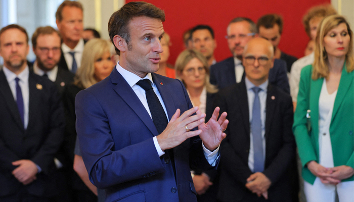 French President Emmanuel Macron delivers a speech during a meeting with rescue forces at the Haute-Savoie prefecture on June 9, 2023. — AFP