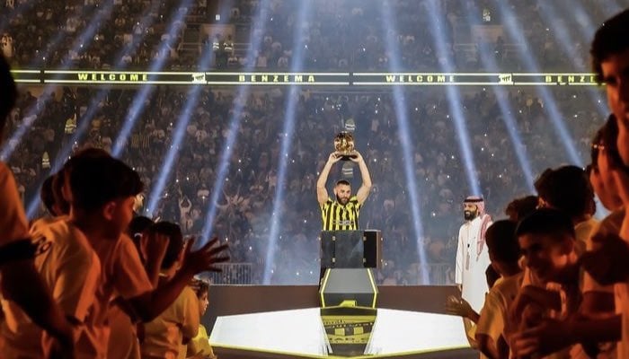 Benzema hoists the Ballon dOr over his head at his welcome gala at a stadium in Jeddah. — Twitter/@Benzema