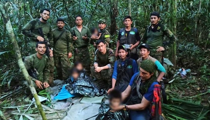 Colombian military soldiers pose for a photo after the rescue of child survivors from a Cessna 206 plane that crashed on May 1 in the jungles of Caqueta, in this handout photo released June 9, 2023. Presidency/Handout via REUTERS