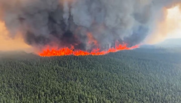 Smoke rises from a wildfire in Tumbler Ridge, British Columbia, Canada, in this screen grab taken from a video, June 8, 2023. — Reuters
