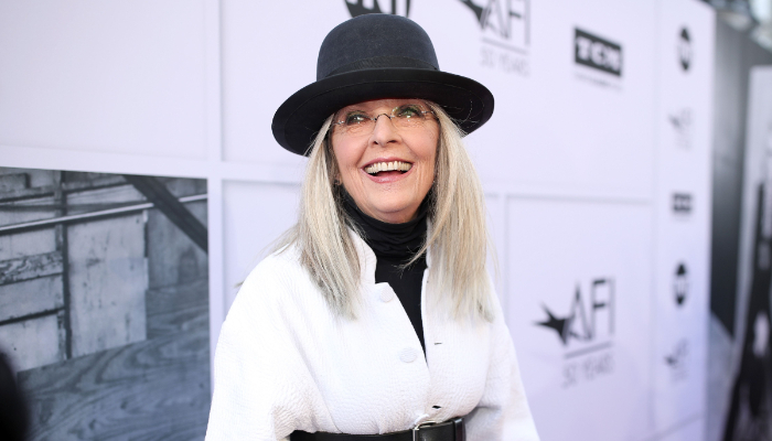 Diane Keaton takes her headwear game to the next level with huge hat costume