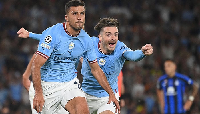 Manchester City´s Spanish midfielder #16 Rodri (L) celebrates scoring his team´s first goal during the UEFA Champions League final football match between Inter Milan and Manchester City at the Ataturk Olympic Stadium in Istanbul, on June 10, 2023. —AFP