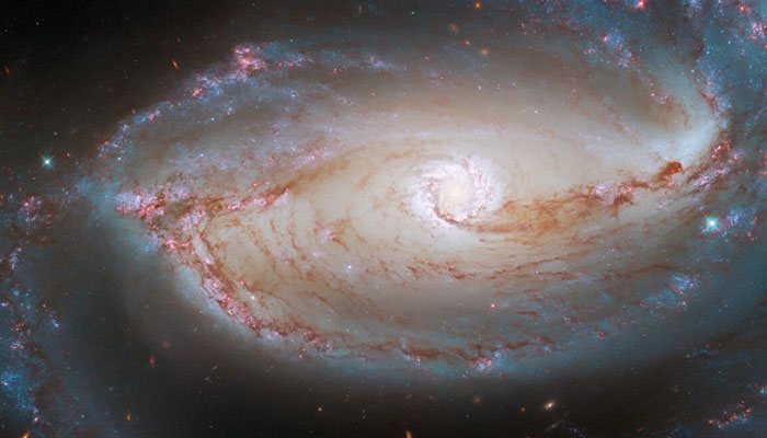 This finely detailed image shows the heart of NGC 1097, a barred spiral galaxy that lies about 48 million light-years from Earth in the constellation Fornax. — Nasa/ESA/File