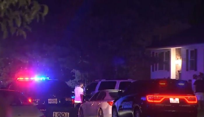 Police vehicles can be seen outside a house in Annapolis, Maryland where the mass shooting took place on June 12, 2023. — Screengrab/YouTube/NBC News