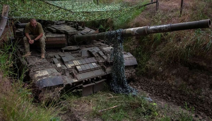 A Ukrainian serviceman sits atop a tank, amid Russias attack on Ukraine, in Donetsk region, Ukraine June 12, 2023.—Reuters