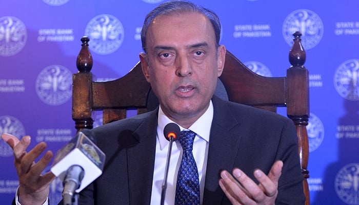 Governor of the State Bank of Pakistan, Jameel Ahmad presents the new fiscal policy at the banks headquarters in Karachi on January 23, 2023. — AFP