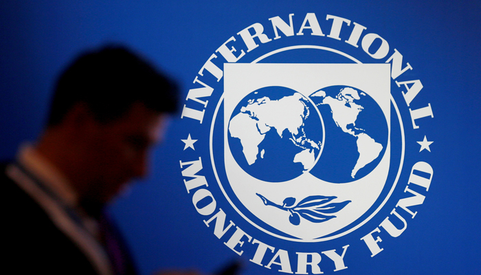 A participant stands near a logo of IMF at the International Monetary Fund — World Bank Annual Meeting 2018 in Nusa Dua, Bali, Indonesia, October 12, 2018. — Reuters