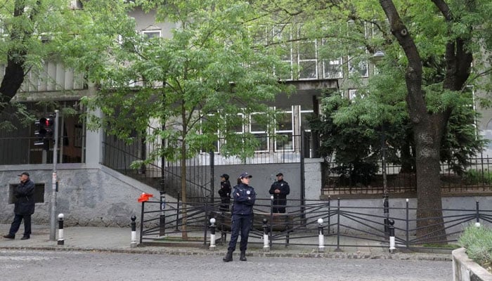 Police officers can be seen securing the area after a crime. — Reuters/File