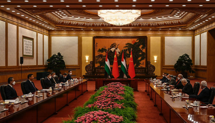 Palestinian President Mahmud Abbas (second right) attends a meeting with Chinas President Xi Jinping (second left) at the Great Hall of the People in Beijing on June 14, 2023. 