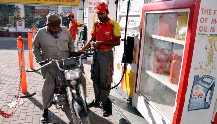 Fuel station worker filling petrol in the vehicle at a fuel station in Hyderabad on January 29, 2023. — PPI