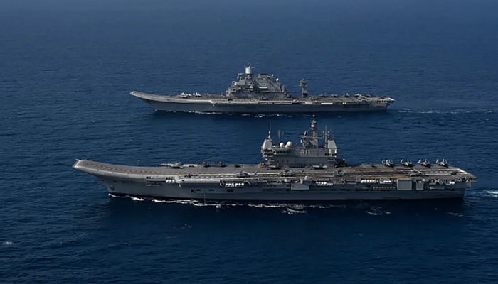 Indias two aircraft carriers, INS Vikramaditya and INS Vikrant, operate in the Arabian Sea in this image from the Indian Navy. — Indian Navy/File